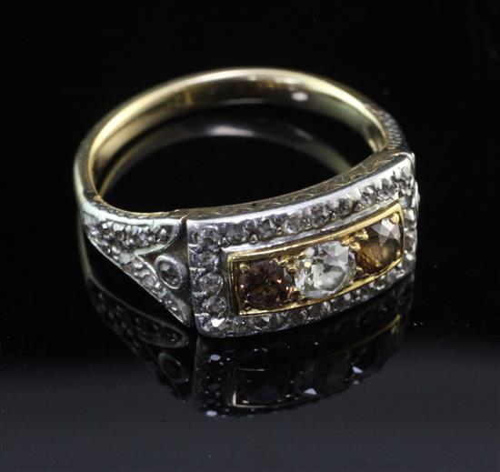 A mid 20th century gold and two colour diamond cluster dress ring, size M.